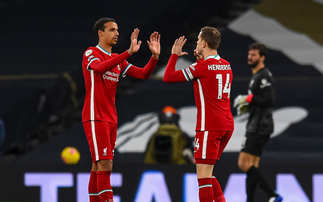 Liverpool's Joel Matip (L) and captain Jordan Henderson before the FA Premier League match between Tottenham Hotspur FC and Liverpool FC at the Tottenham Hotspur Stadium