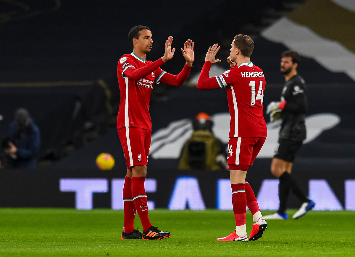 Liverpool's Joel Matip (L) and captain Jordan Henderson before the FA Premier League match between Tottenham Hotspur FC and Liverpool FC at the Tottenham Hotspur Stadium