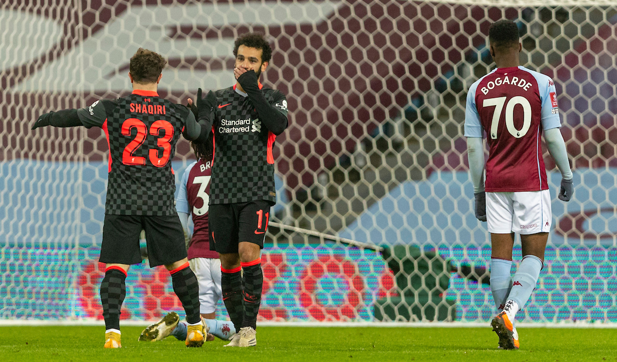Liverpool's Mohamed Salah (R) celebrates after scoring the fourth goal with team-mate Xherdan Shaqiri during the FA Cup 3rd Round match between Aston Villa FC and Liverpool FC at Villa Park