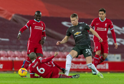 Manchester United's Scott McTominay (R) tackles Liverpool's Thiago Alcantara during the FA Premier League match between Liverpool FC and Manchester United FC at Anfield