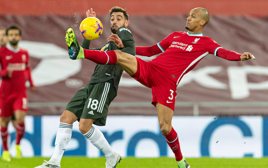 Liverpool's Fabio Henrique Tavares 'Fabinho' (R) and Manchester United's Bruno Fernandes during the FA Premier League match between Liverpool FC and Manchester United FC at Anfield