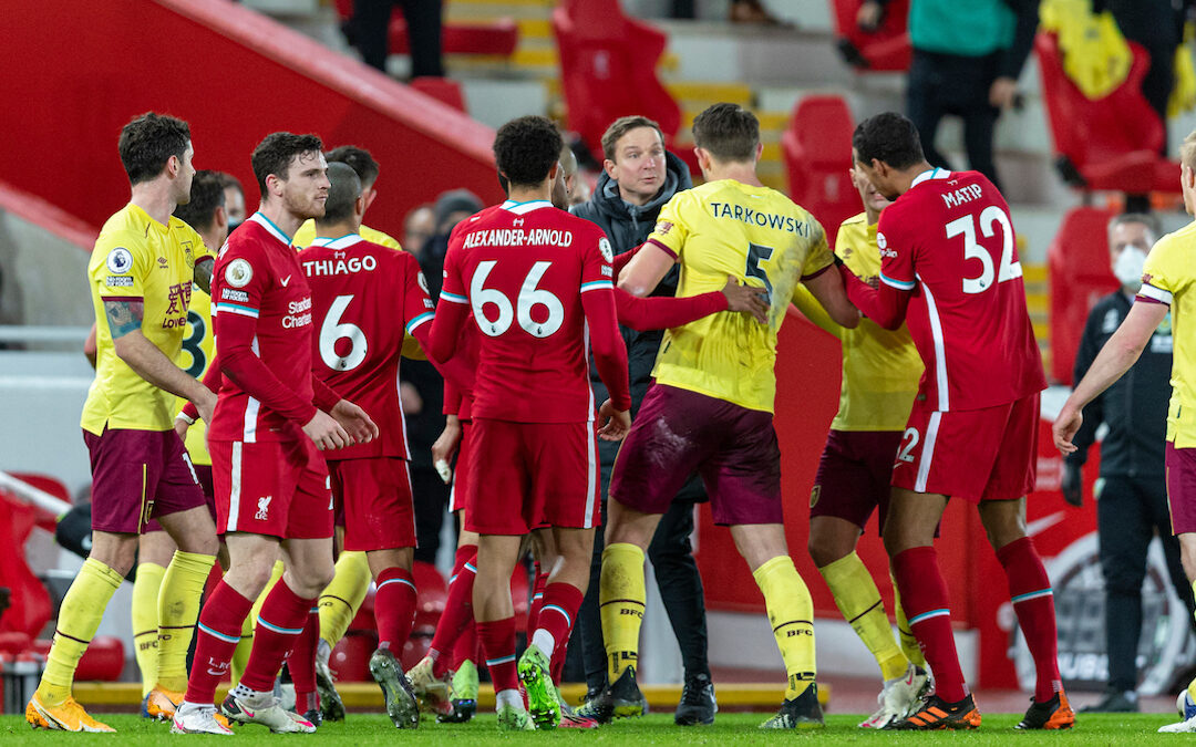 Liverpool's first-team development coach Pepijn Lijnders and Burnley's James Tarkowski clash at half-time during the FA Premier League match between Liverpool FC and Burnley FC at Anfield