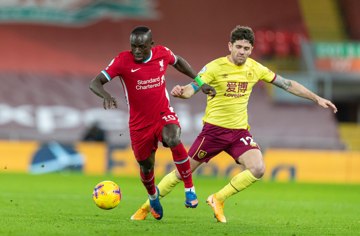 Liverpool's Sadio Mané (L) and Burnley's Robbie Brady during the FA Premier League match between Liverpool FC and Burnley FC at Anfield