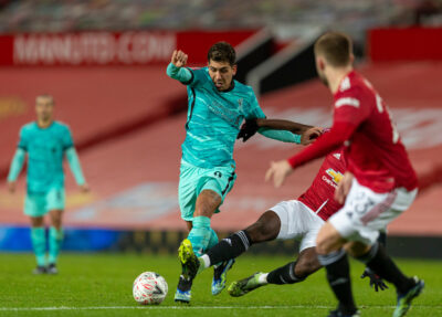 Liverpool's Roberto Firmino is tackled by Manchester United's Paul Pogba during the FA Cup 4th Round match between Manchester United FC and Liverpool FC at Old Trafford