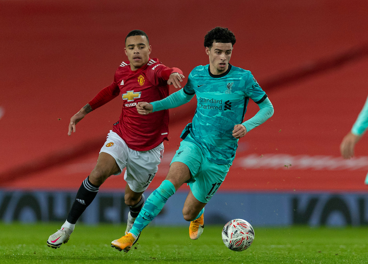 Liverpool's Curtis Jones (R) and Manchester United's Mason Greenwood during the FA Cup 4th Round match between Manchester United FC and Liverpool FC at Old Trafford