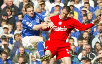 Liverpool's Jamie Carragher and Everton's Wayne Rooney during the Merseyside Derby Premiership match at Goodison Park