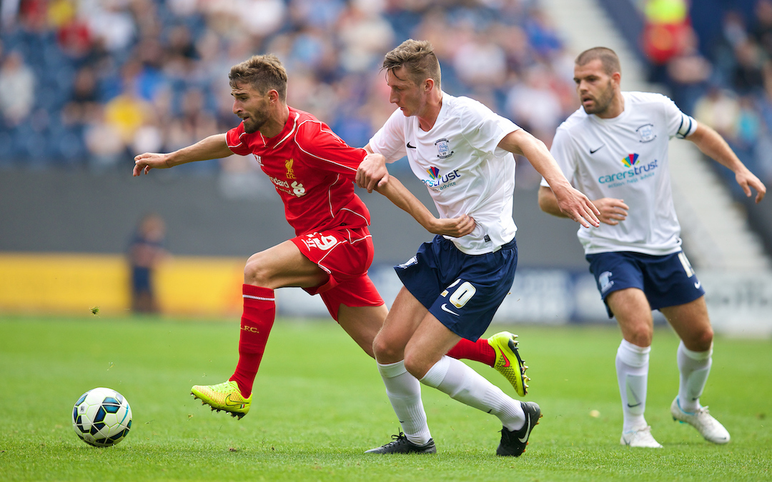 Liverpool's Fabio Borini in action against Preston North End's Ben Davies during a preseason friendly match at Deepdale Stadium