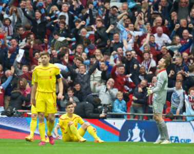 Liverpool's Dejan Lovren and goalkeeper Simon Mignolet look dejected as Aston Villa score the second goal during the FA Cup Semi-Final match at Wembley Stadium