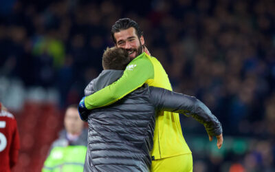 Liverpool's goalkeeper Alisson Becker and Xherdan Shaqiri celebrate after the FA Premier League match between Liverpool FC and Everton FC at Anfield, the 232nd Merseyside Derby