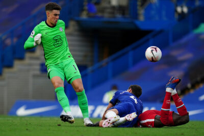 Liverpool’s Sadio Mané is fouled by Chelsea's captain Andreas Christensen, who was later shown a red card after a VAR review, during the FA Premier League match between Chelsea FC and Liverpool FC at Stamford Bridge