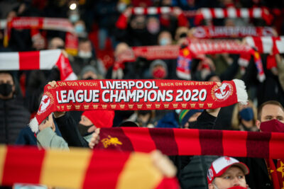 Liverpool supporters on the Spion Kop sing "You'll Never Walk Alone" before the FA Premier League match between Liverpool FC and Wolverhampton Wanderers FC at Anfield