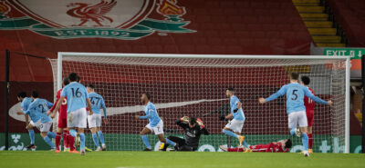 Liverpool's goalkeeper Alisson Becker looks dejected as Manchester City score the opening goal during the FA Premier League match between Liverpool FC and Manchester City FC at Anfield