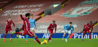 Liverpool's Mohamed Salah scores the first equalising goal from a penalty kick during the FA Premier League match between Liverpool FC and Manchester City FC at Anfield