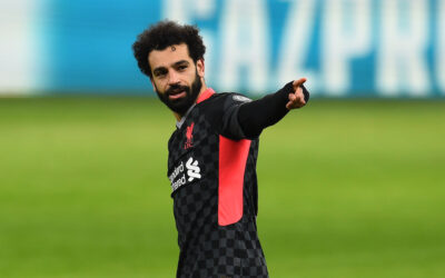 Liverpool's Mohamed Salah celebrates after scoring the first goal during the UEFA Champions League Round of 16 1st Leg game between RB Leipzig and Liverpool FC at the Puskás Aréna