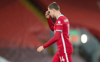 Liverpool's captain Jordan Henderson looks dejected as he walks off injured during the FA Premier League match between Liverpool FC and Everton FC, the 238th Merseyside Derby, at Anfield