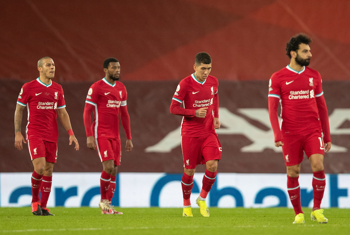 Liverpool's Thiago Alcantara and Roberto Firmino look dejected as Everton score the second goal during the FA Premier League match between Liverpool FC and Everton FC, the 238th Merseyside Derby, at Anfield