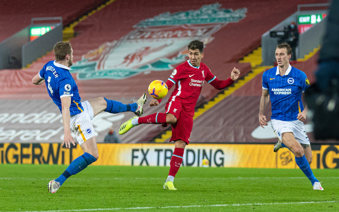 Liverpool's Roberto Firmino shoots during the FA Premier League match between Liverpool FC and Brighton & Hove Albion FC at Anfield