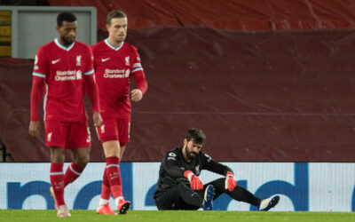 Liverpool's goalkeeper Alisson Becker looks dejected as Manchester City score the second goal during the FA Premier League match between Liverpool FC and Manchester City FC at Anfield