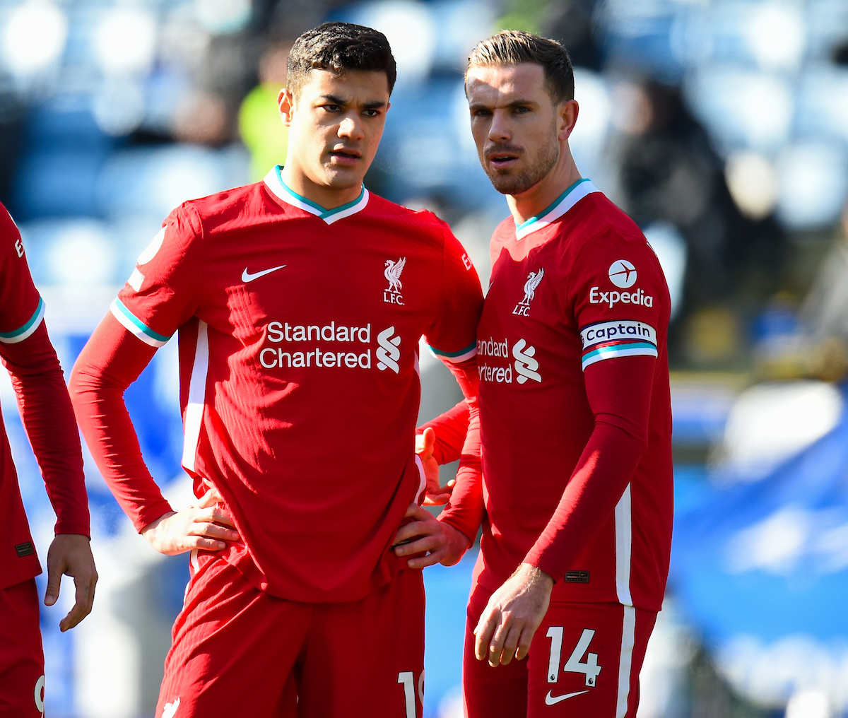 Liverpool's Ozan Kabak (L) and captain Jordan Henderson during the FA Premier League match between Leicester City FC and Liverpool FC at the King Power Stadium