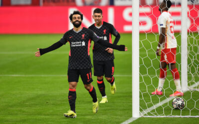 Liverpool's Mohamed Salah celebrates after scoring the first goal during the UEFA Champions League Round of 16 1st Leg game between RB Leipzig and Liverpool FC at the Puskás Aréna