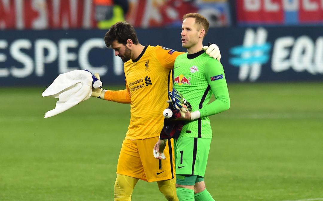 Liverpool's goalkeeper Alisson Becker (L) and RB Leipzig's goalkeeper Péter Gulácsi after the UEFA Champions League Round of 16 1st Leg game between RB Leipzig and Liverpool FC at the Puskás Aréna