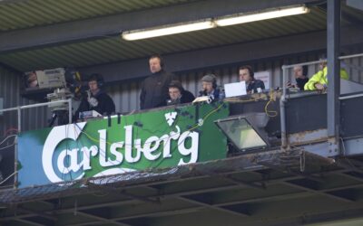 Saturday, April 11, 2009: BBC Radio reporter Alan Green and a television camera in the gantry at Liverpool's Anfield Stadium during the Premiership match between Liverpool and Blackburn Rovers