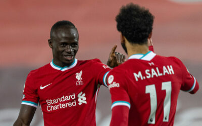 Sadio Mane celebrates with Mohamed Salah during the Premier League match between Liverpool FC and Wolves