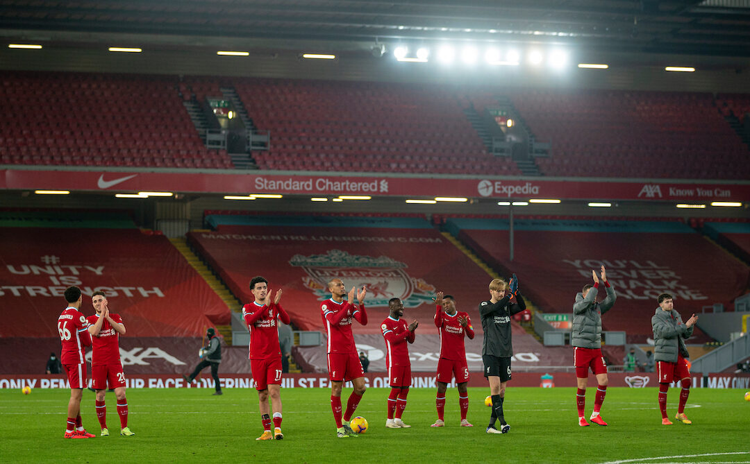 Liverpool players applaud the supporters after the Premier League match against Wolves at Anfield