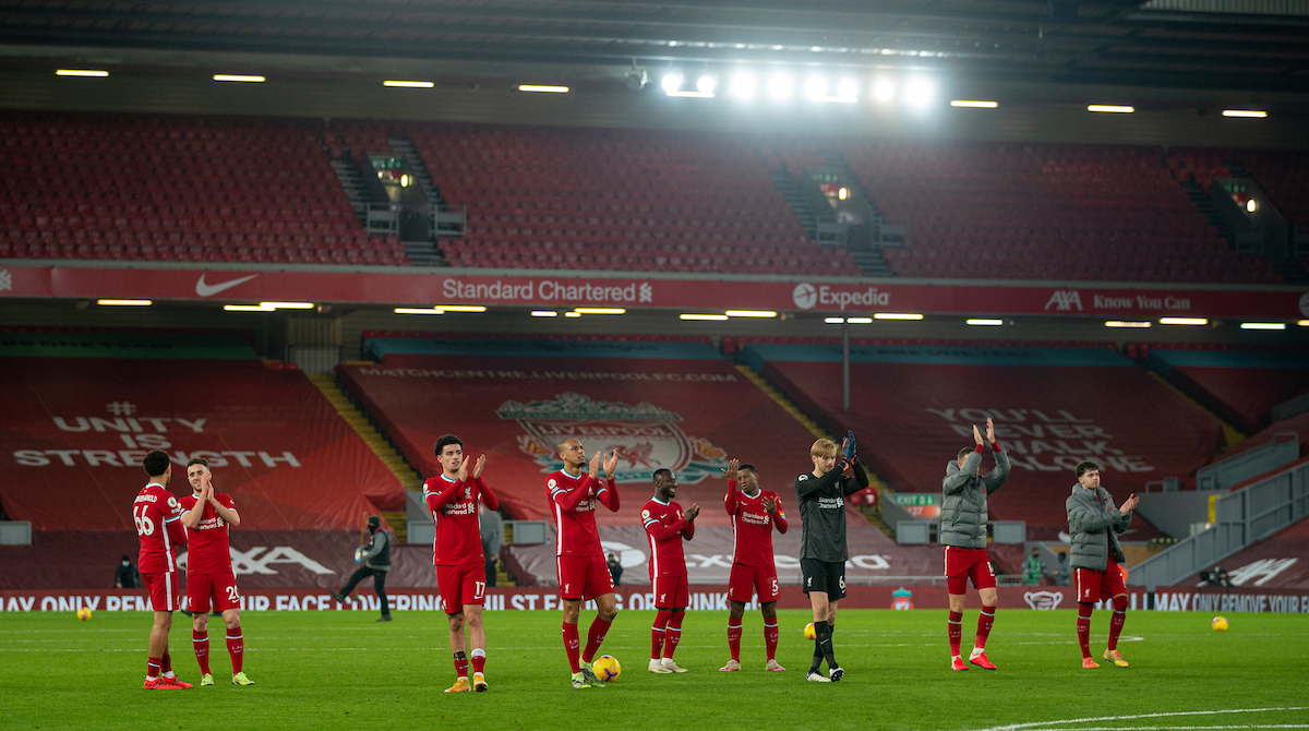 Liverpool players applaud the supporters after the Premier League match against Wolves at Anfield