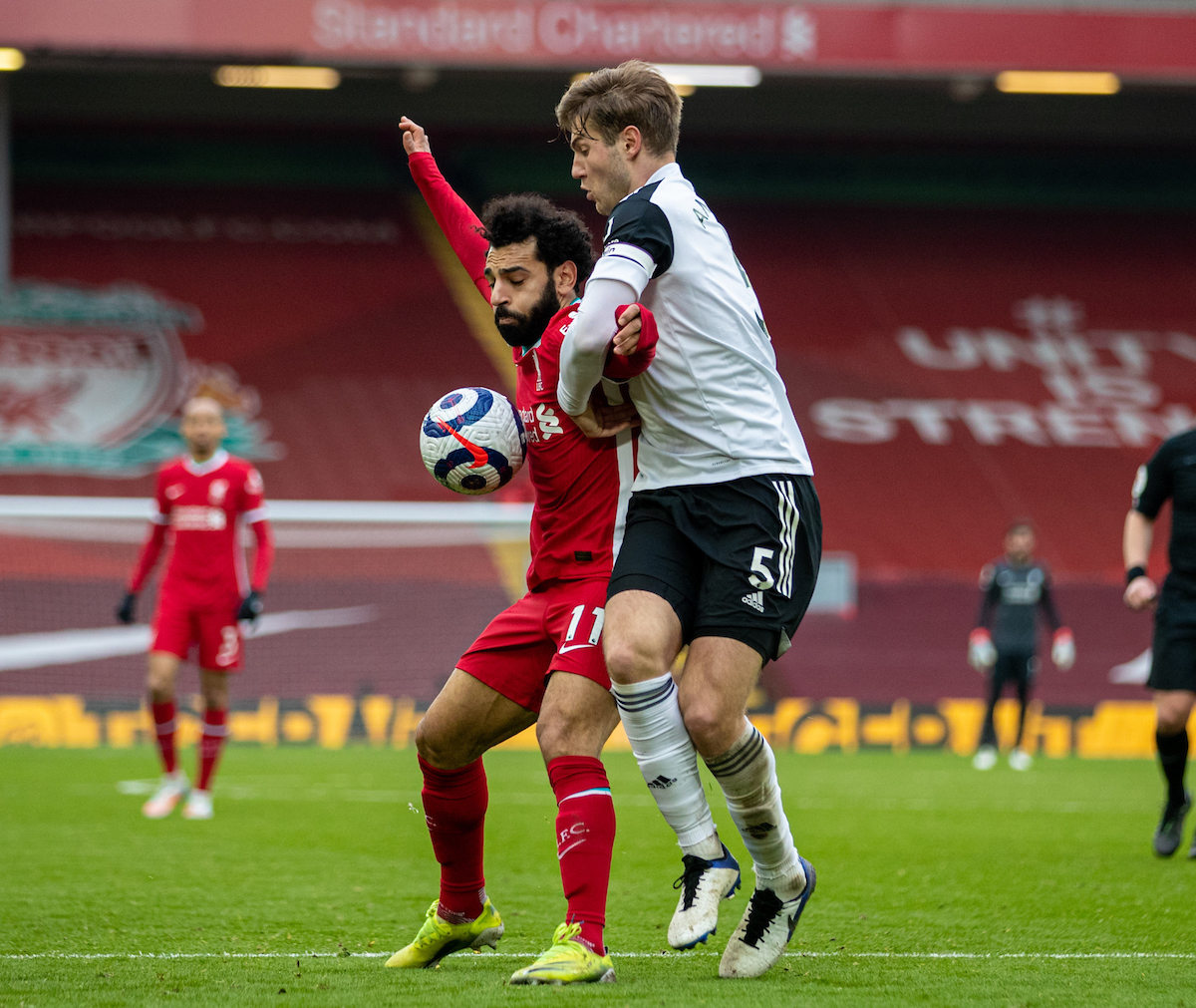 Liverpool's Mohamed Salah battles with Fulham's Joachim Andersen during the Premier League match