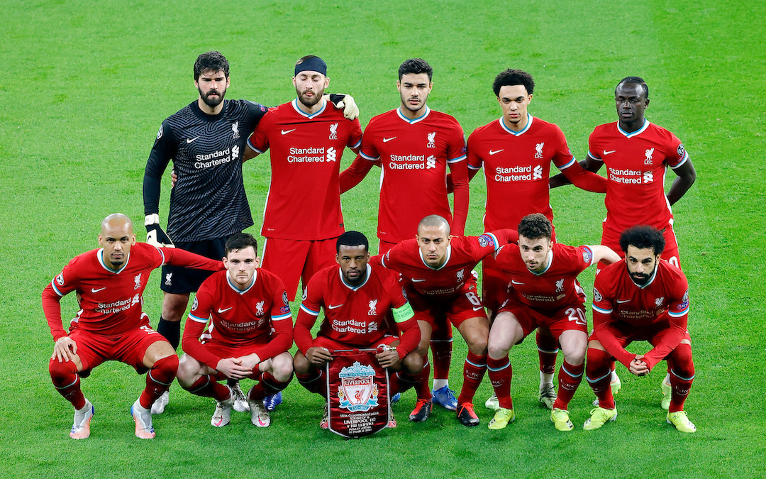 Liverpool's players line-up for a team group photograph before the UEFA Champions League Round of 16 2nd Leg game between Liverpool FC and RB Leipzig at the Puskás Aréna
