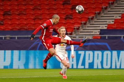 Liverpool's Thiago Alcantara (L) and RB Leipzig's Emil Forsberg during the UEFA Champions League Round of 16 2nd Leg game between Liverpool FC and RB Leipzig at the Puskás Aréna