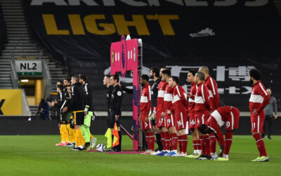 Liverpool players line-up before the Premier League match against Wolves at Molineux Stadium