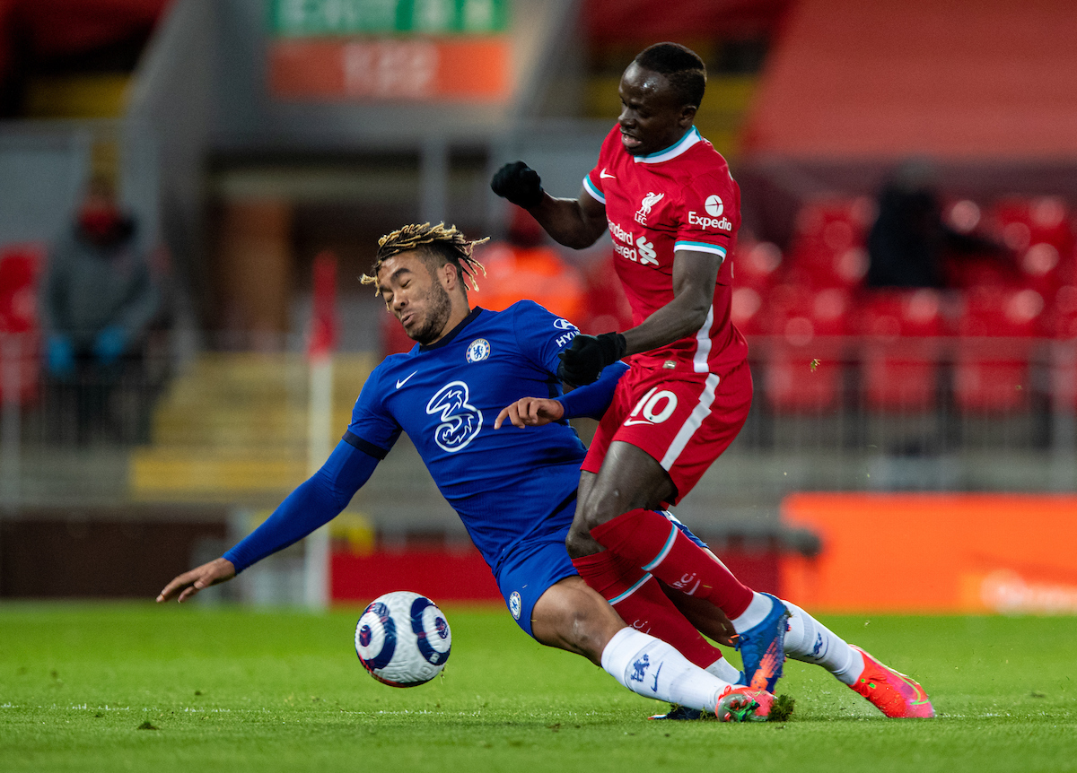 Liverpool's Sadio Mané (R) is tackled by Chelsea's Reece James during the FA Premier League match between Liverpool FC and Chelsea FC at Anfield