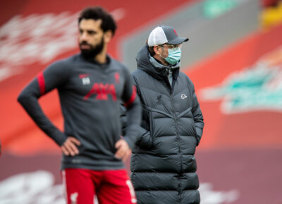 Liverpool's manager Jürgen Klopp (R) and Mohamed Salah (L) during the pre-match warm-up before the FA Premier League match between Liverpool FC and Fulham FC at Anfield