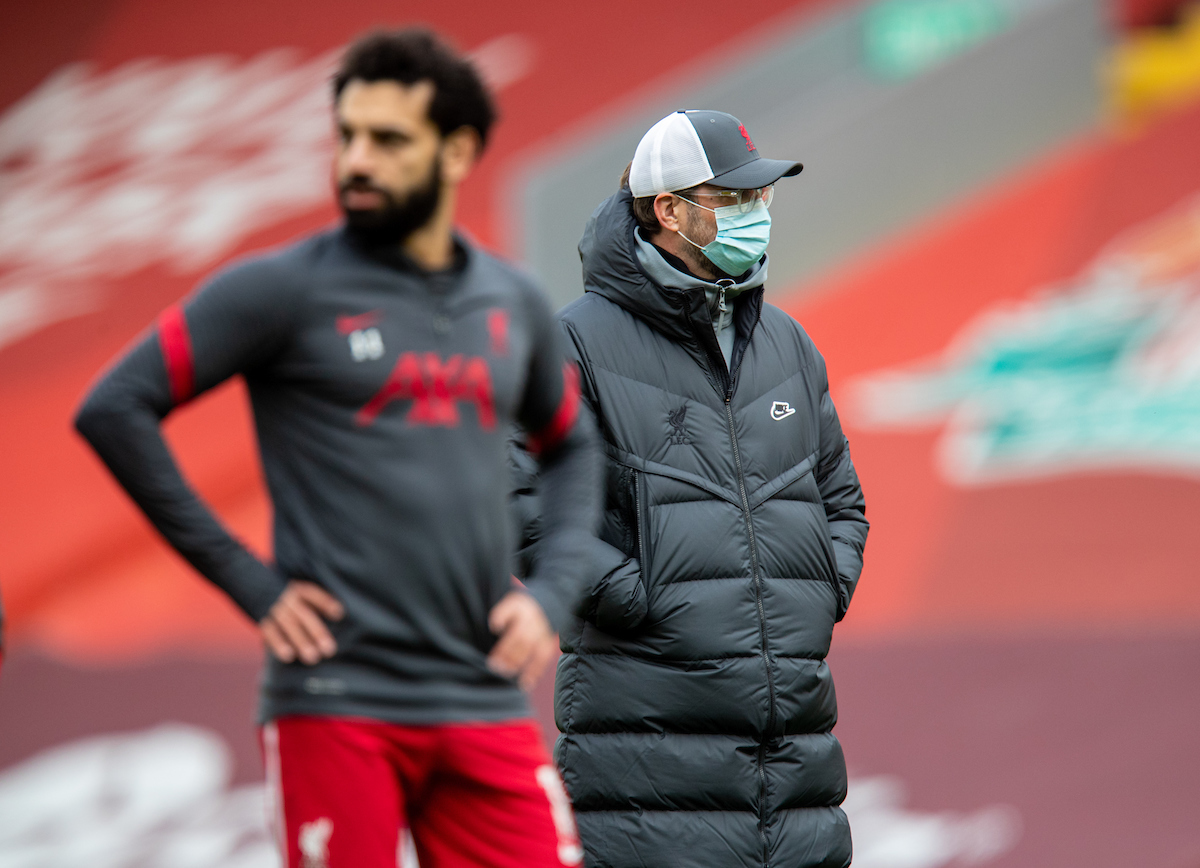 Liverpool's manager Jürgen Klopp (R) and Mohamed Salah (L) during the pre-match warm-up before the FA Premier League match between Liverpool FC and Fulham FC at Anfield