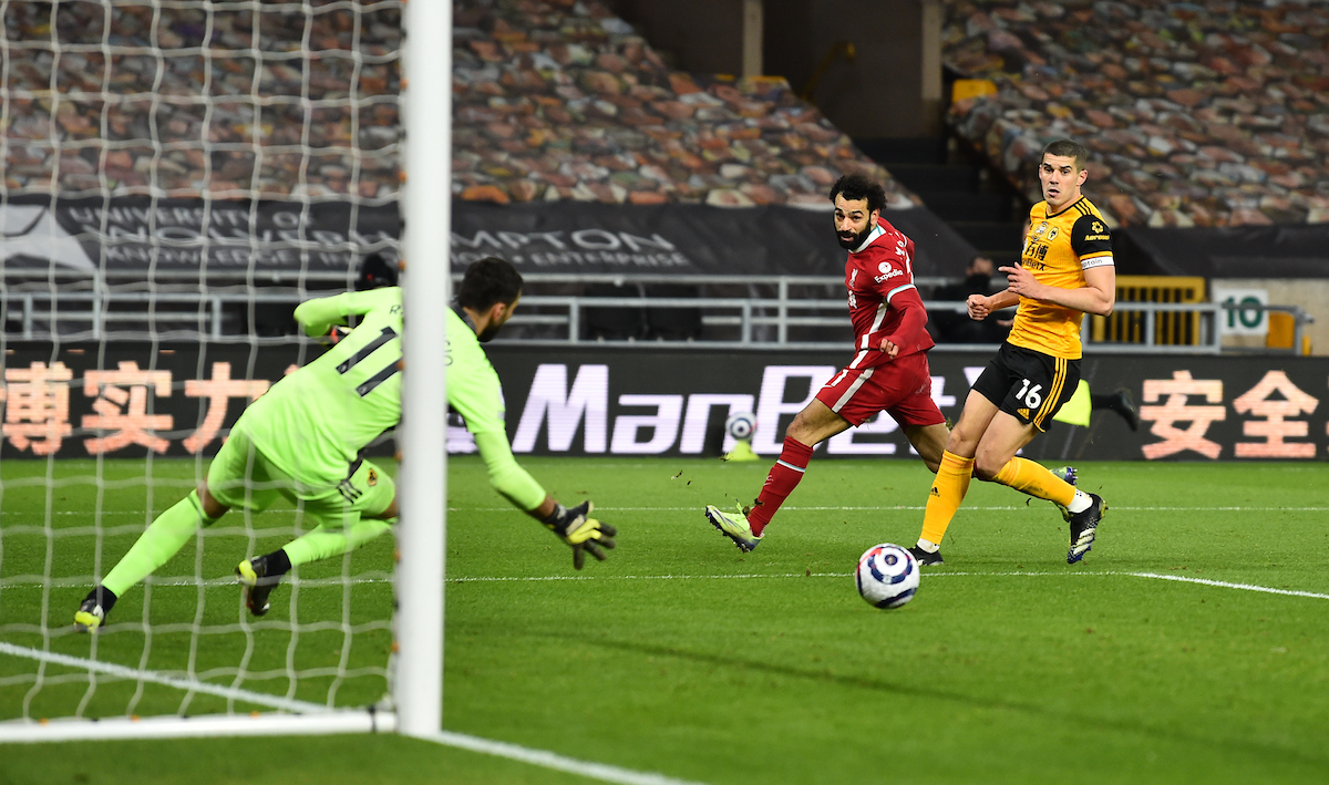 Mohamed Salah sees his shot saved by Rui Patricio during the Premier League match between Wolves and Liverpool FC at Molineux Stadium
