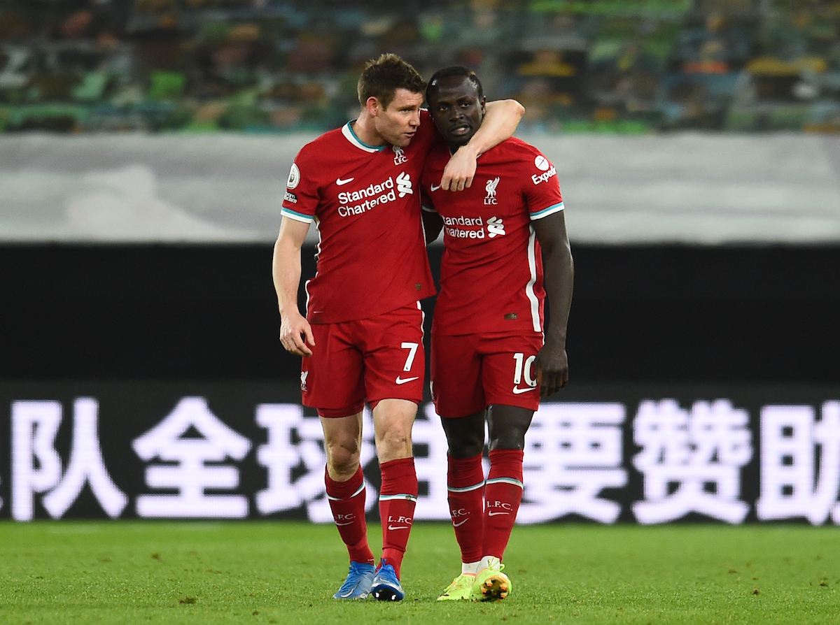 James Milner and Sadio Mane after the Premier League match between Wolves and Liverpool FC at Molineux Stadium