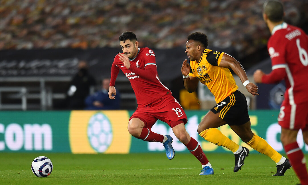 Ozan Kabak and Adama Traore during the Premier League match between Wolves and Liverpool FC at Molineux Stadium