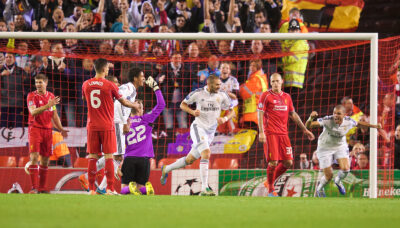 Wednesday, October 22, 2014: Real Madrid CF's Karim Benzema celebrates scoring the third goal against Liverpool during the UEFA Champions League Group B match at Anfield.
