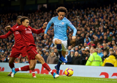 Thursday, January 3, 2019: Liverpool's Trent Alexander-Arnold (L) tackles Manchester City's Leroy Sane during the FA Premier League match between Manchester City FC and Liverpool FC at the Etihad Stadium.