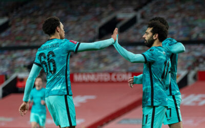 Liverpool's Mohamed Salah (R) celebrates after scoring the first goal with team-mate Trent Alexander-Arnold (L) during the FA Cup 4th Round match between Manchester United FC and Liverpool FC at Old Trafford. Manchester United won 3-2.