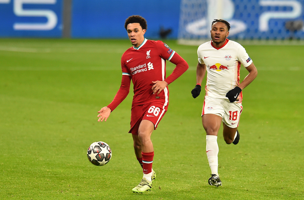 BUDAPEST, HUNGARY - Wednesday, March 10, 2021: Liverpool's Trent Alexander-Arnold (L) and RB Leipzig's Christopher Nkunku during the UEFA Champions League Round of 16 2nd Leg game between Liverpool FC and RB Leipzig at the Puskás Aréna. Liverpool won 2-0, 4-0 on aggregate.