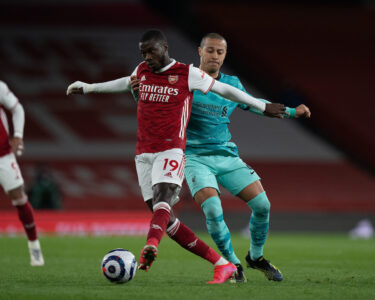 Liverpool's Thiago Alcantara (R) and Arsenal's Nicolas Pépé during the FA Premier League match between Arsenal FC and Liverpool FC at the Emirates Stadium