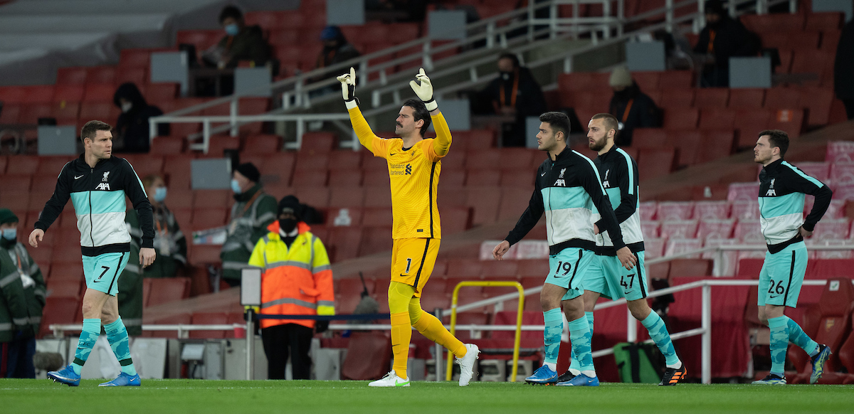 Liverpool's goalkeeper Alisson Becker walks out before the FA Premier League match between Arsenal FC and Liverpool FC at the Emirates Stadium