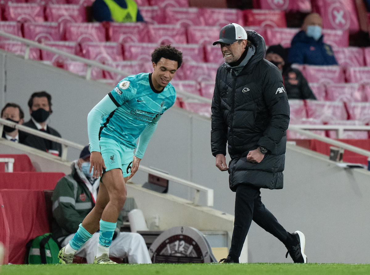 Liverpool's manager Jürgen Klopp (R) and Trent Alexander-Arnold during the FA Premier League match between Arsenal FC and Liverpool FC at the Emirates Stadium