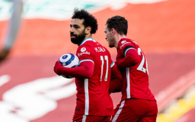 Liverpool's Mohamed Salah celebrates after scoring the first equalising goal during the FA Premier League match between Liverpool FC and Aston Villa FC at Anfield.