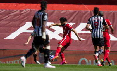 Liverpool's Mohamed Salah scores the first goal during the FA Premier League match between Liverpool FC and Newcastle United FC at Anfield.