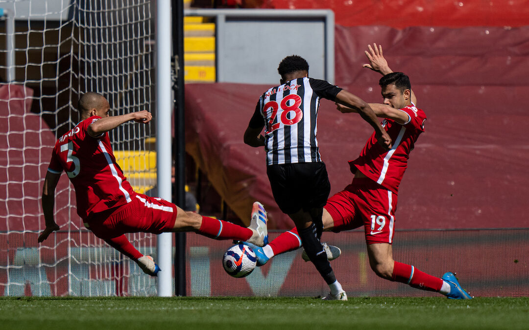 Newcastle United's Joe Willock scores an equalising goal in the 95th minute during the FA Premier League match between Liverpool FC and Newcastle United FC at Anfield.