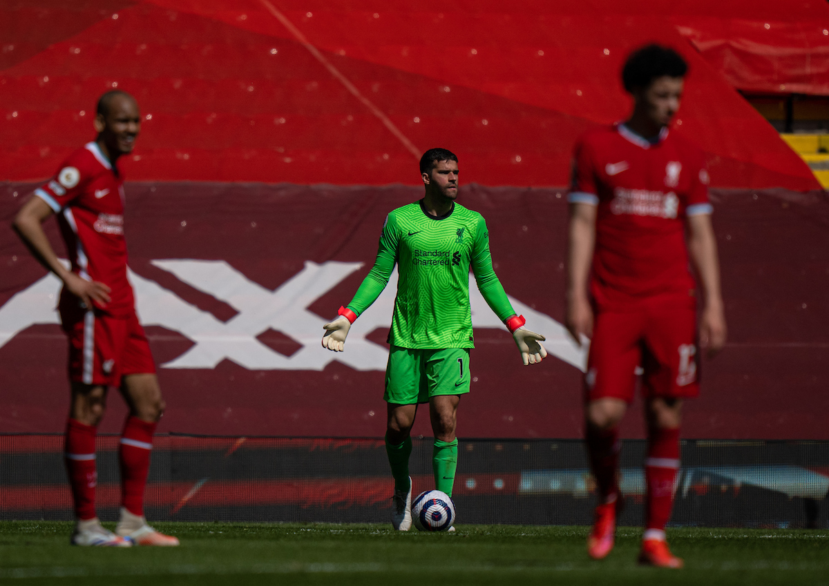 Liverpool's goalkeeper Alisson Becker looks dejected after his side concede a 95th minute equalising goal during the FA Premier League match between Liverpool FC and Newcastle United FC at Anfield.